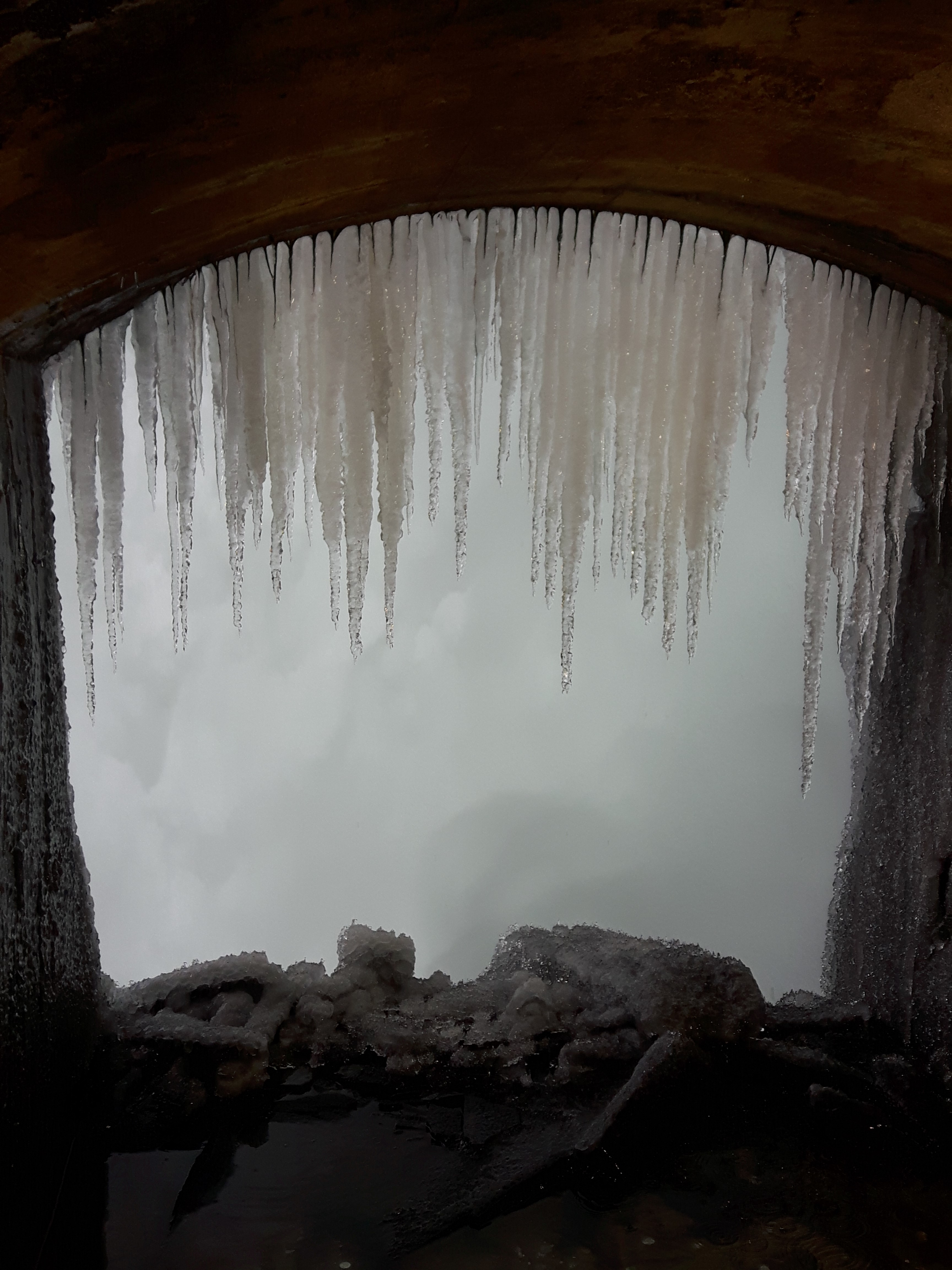 A journey behind the falls will have you feeling like you're in a Winter paradise