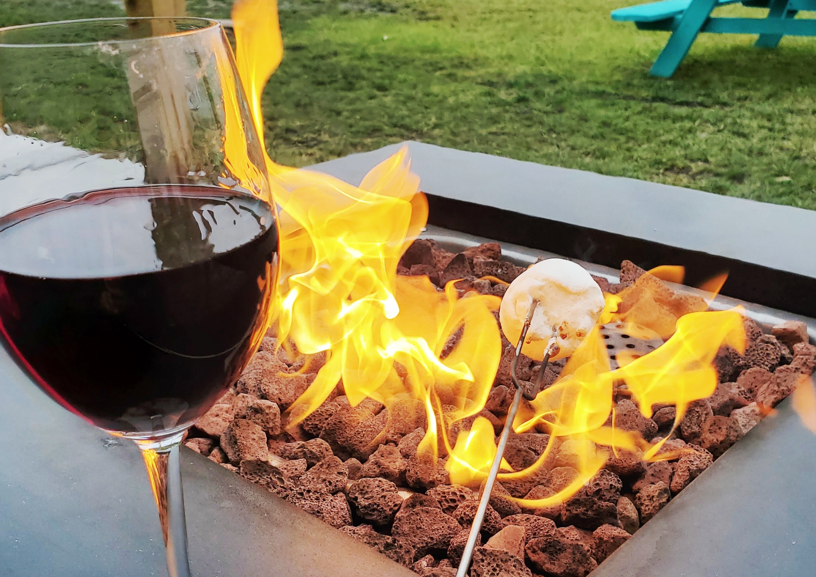 Enjoying roasting my marshmellow while sipping on a glass of fine Merlot at De Simone Winery