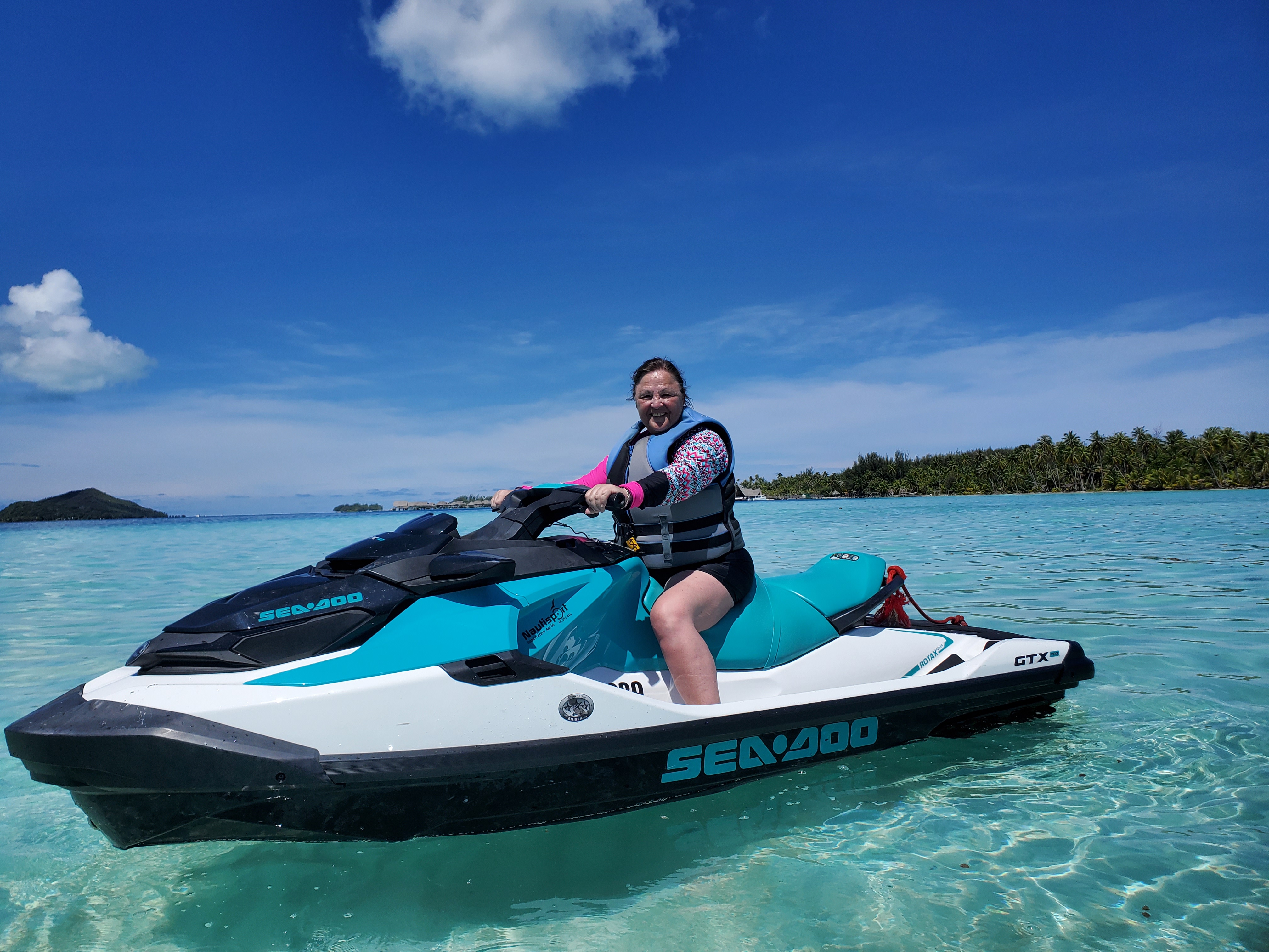 When visiting Bora Bora, book a tour of the lagoon by jetski.  Pack a rashguard for your time spent on the water.