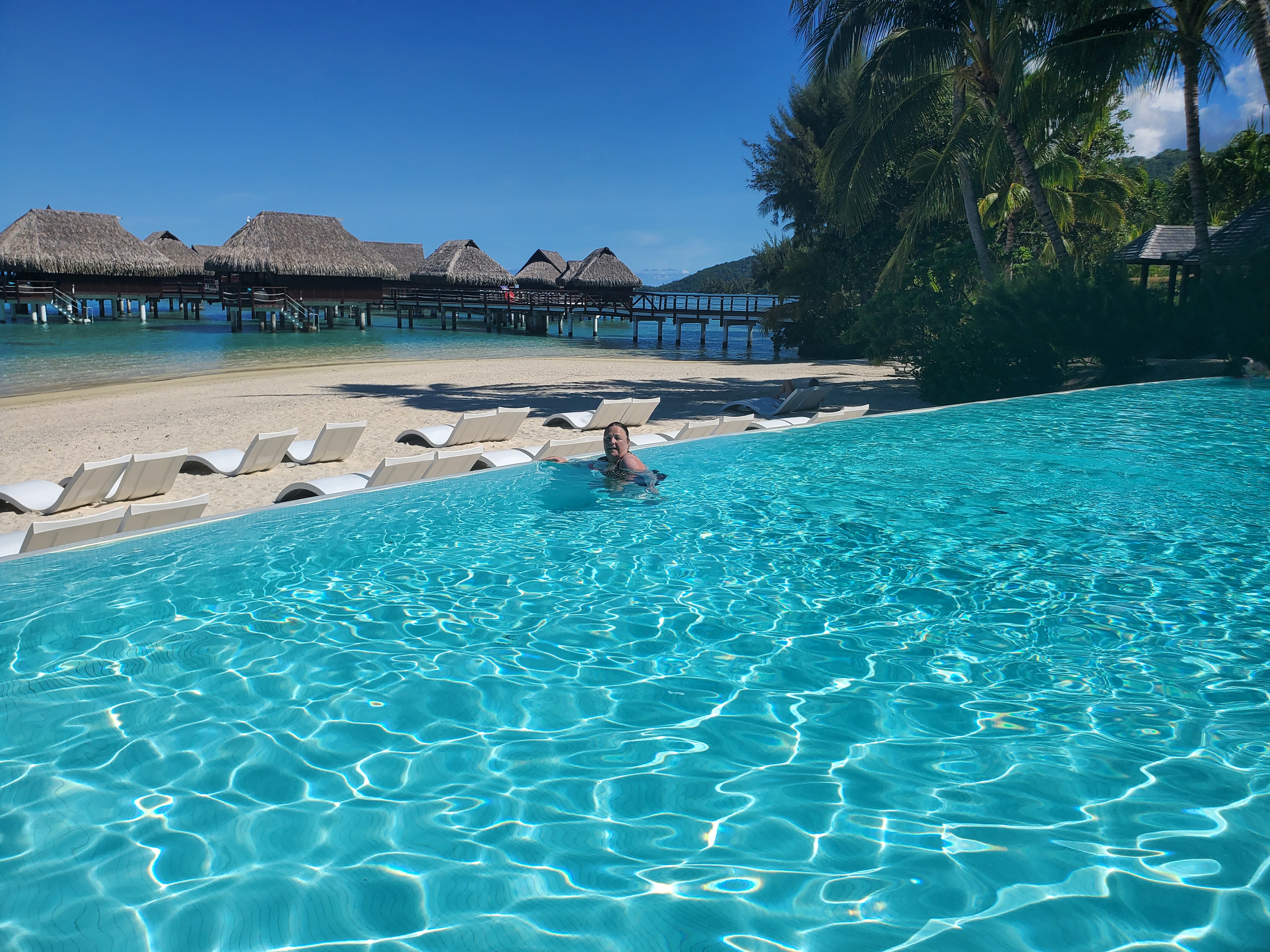 Take in the beauty of the lagoon from the pool at Sofitel Kia Ora Moorea Beach Resort