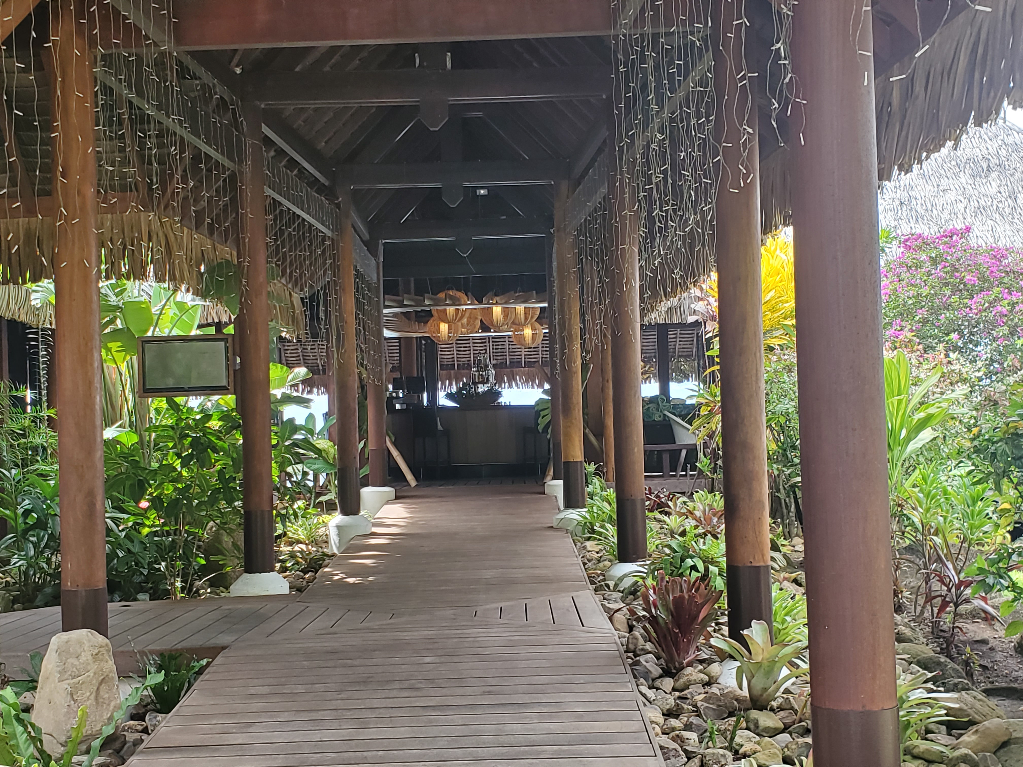 Entrance to Vu Bar located directly adjacent to the outdoor pool at Sofitel Kia Ora Moorea Beach Resort