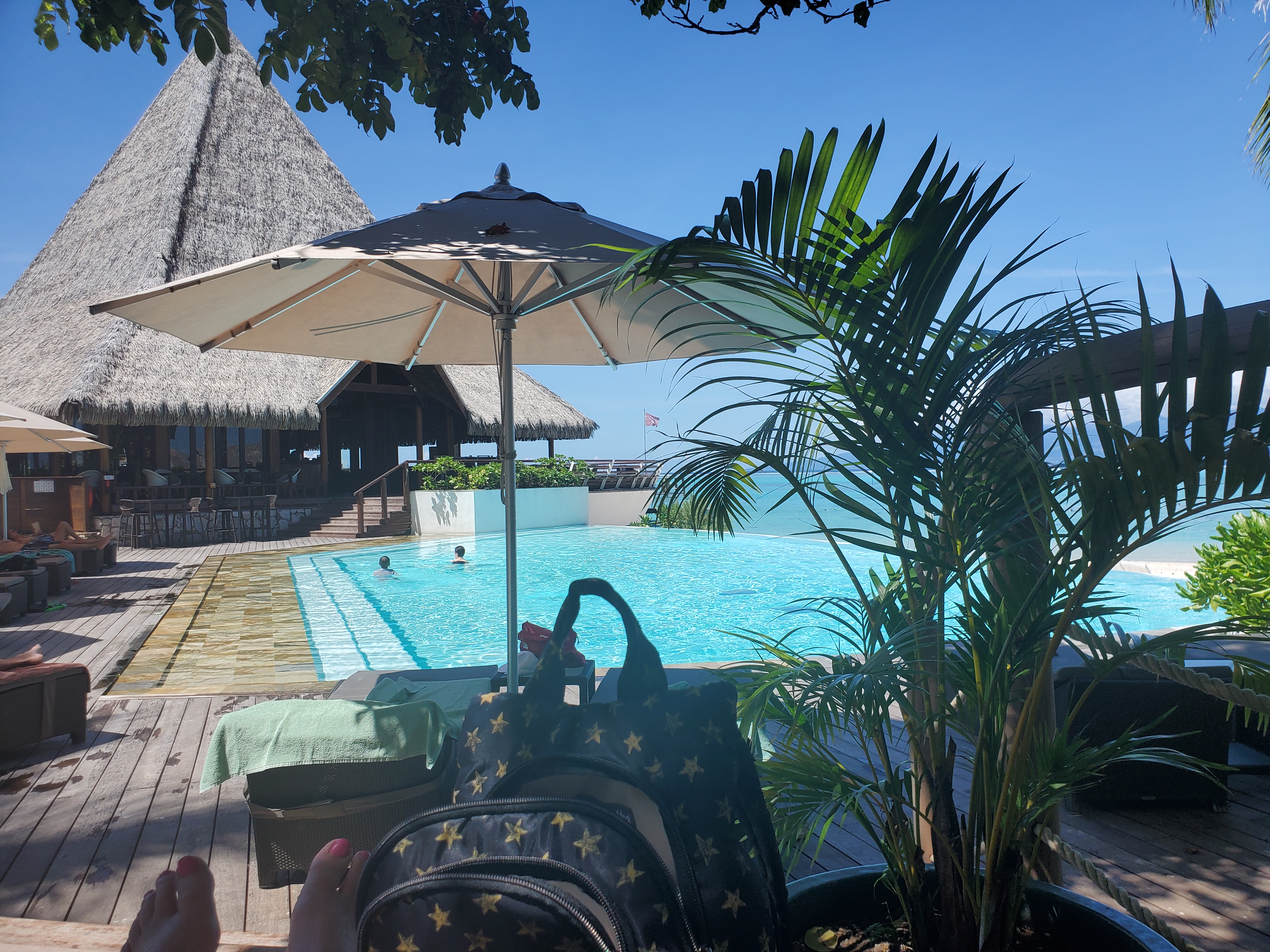 There is not a lot of shade at the pool at Sofitel Kia Ora Moorea Beach Resort.  Use biodegrable sunscreen