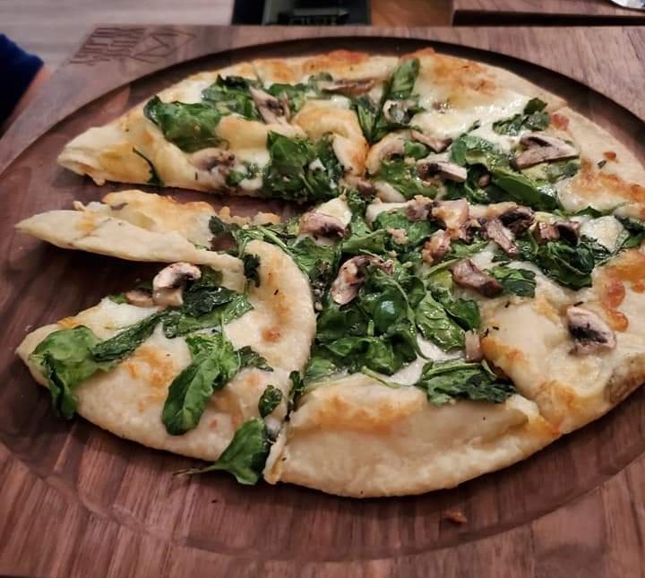 Waterloo Brewing not only offers great beer, but the pizza is even better.  In my opinion it's the best place in Kitchener for pizza and light pub fare