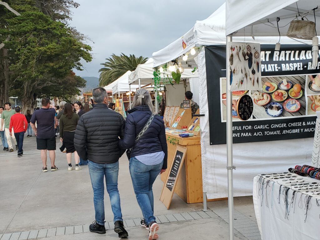 Enjoy the shops and local musicians as you stroll the promenade in Sitges