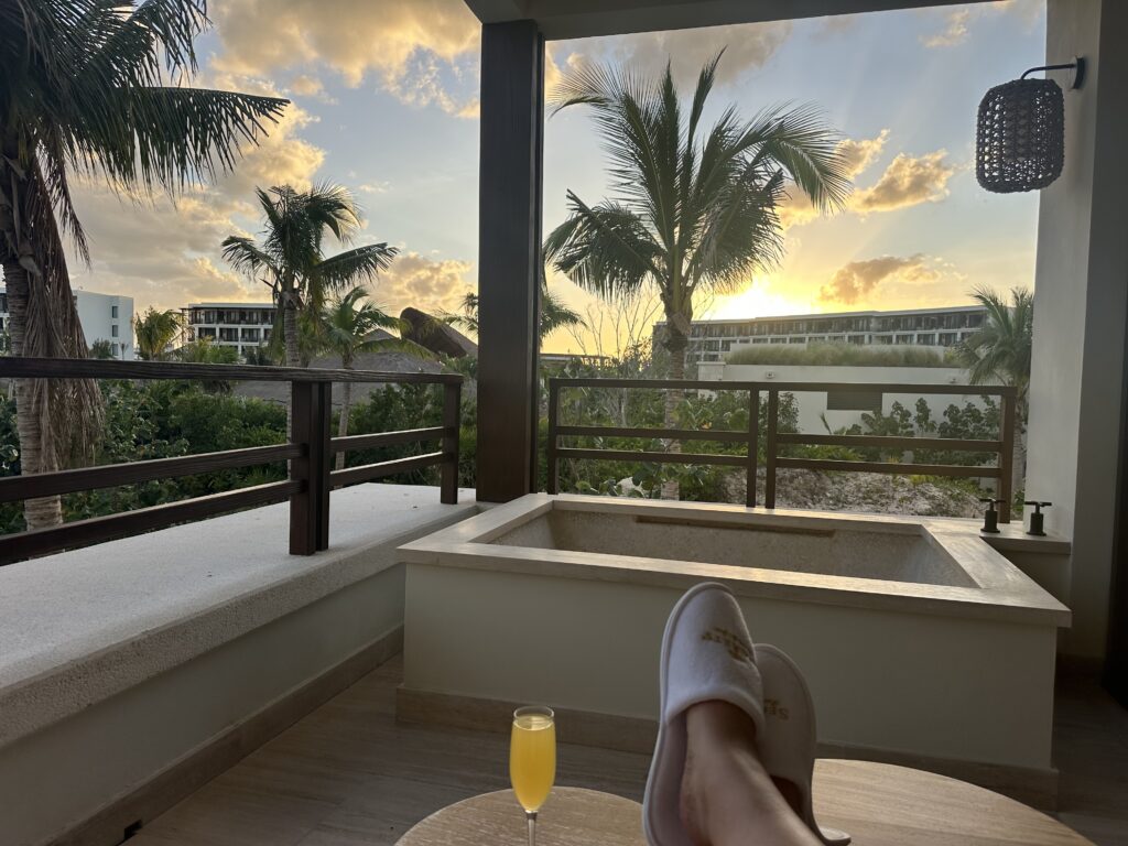 Enjoy solo time while taking in the sunset from your balcony at Secrets, Isla Mejures