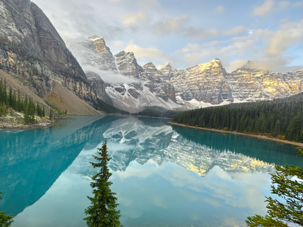 Watching the sun rise at Morraine Lake is a bucket list thing to see and do in Canada for solo travellers