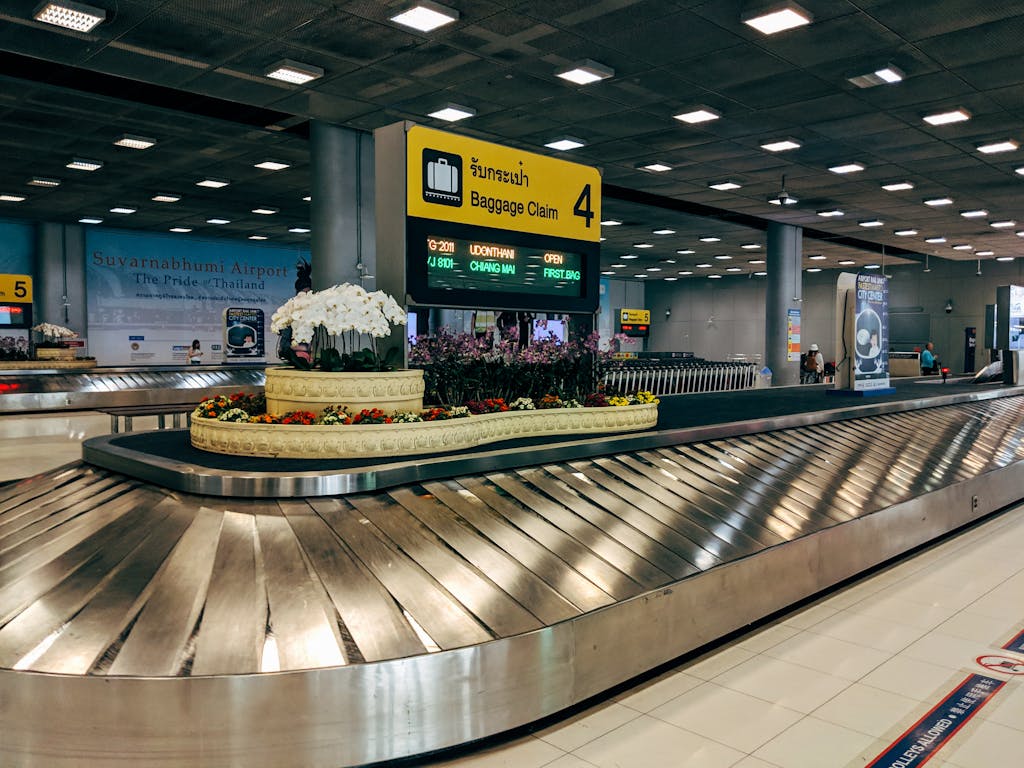 Modern baggage claim area at Suvarnabhumi Airport in Bangkok with lost luggage