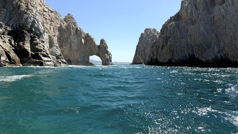 Stunning view of El Arco rock formation in Cabo San Lucas with vibrant blue sea is the best thing to do in Los Cabo