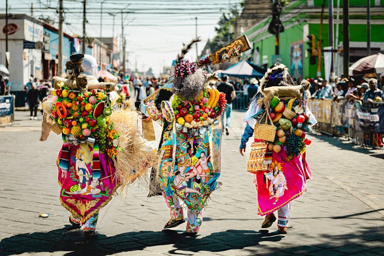 Colorful costumes in a vibrant festival parade in Mexico on my first international trip